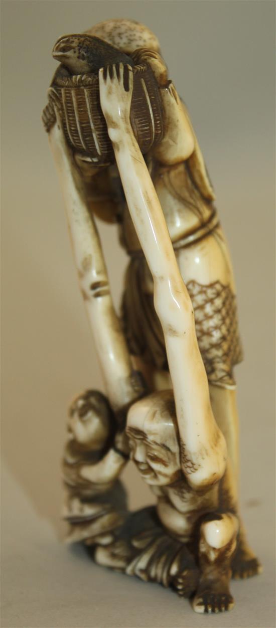 A Japanese ivory okimono of Ashinaga and Tenaga, Meiji period, 10.3cm
